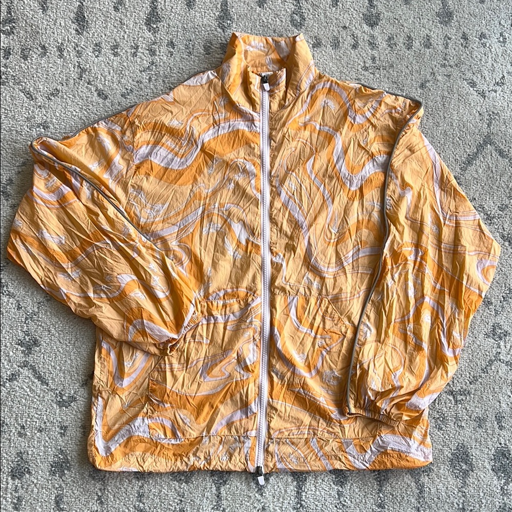 Fabletics Orange and White Tempo Lightweight Windbreaker